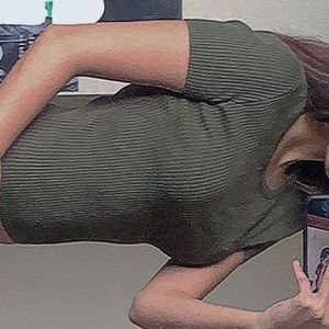 a comfortable form fitting green shirt